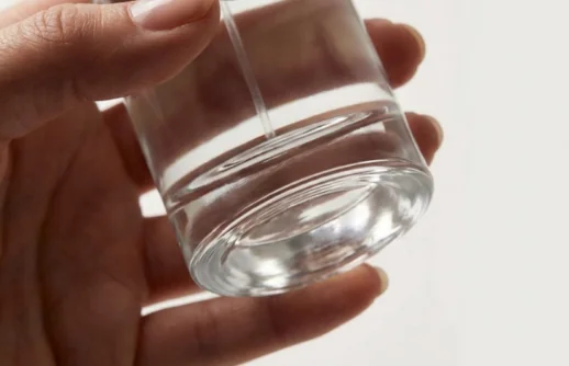 Heavy bottom perfume bottle showing premium glass thickness.
