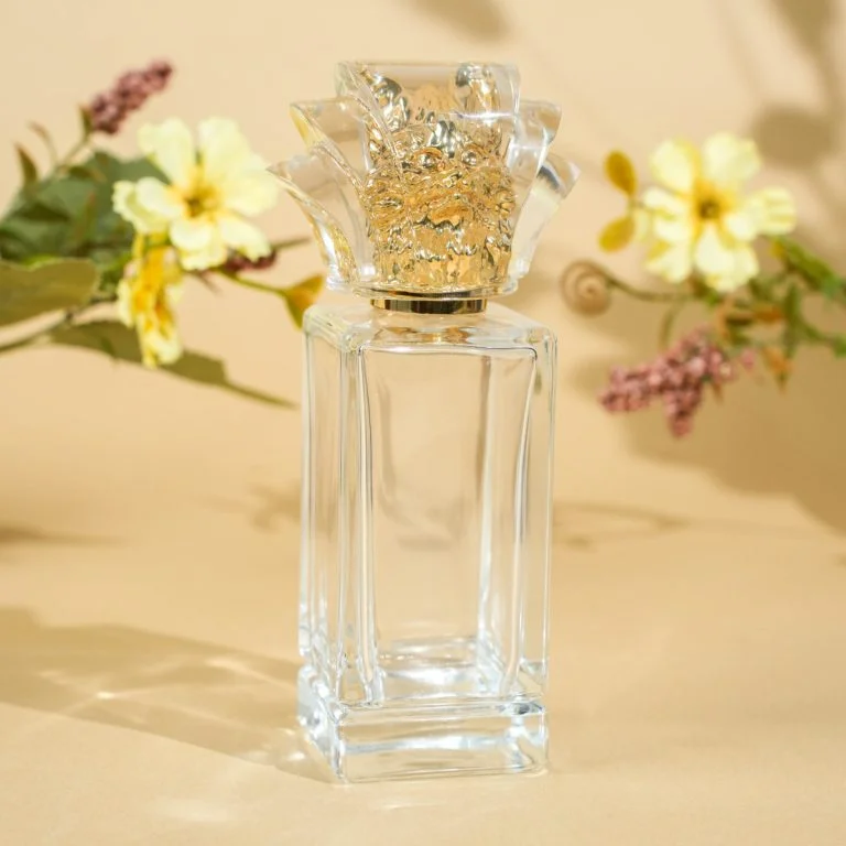 Luxury rectangular glass perfume bottle with golden carved cap