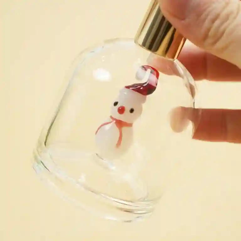Custom refillable perfume bottle with embedded internal logo and UV printed graphics